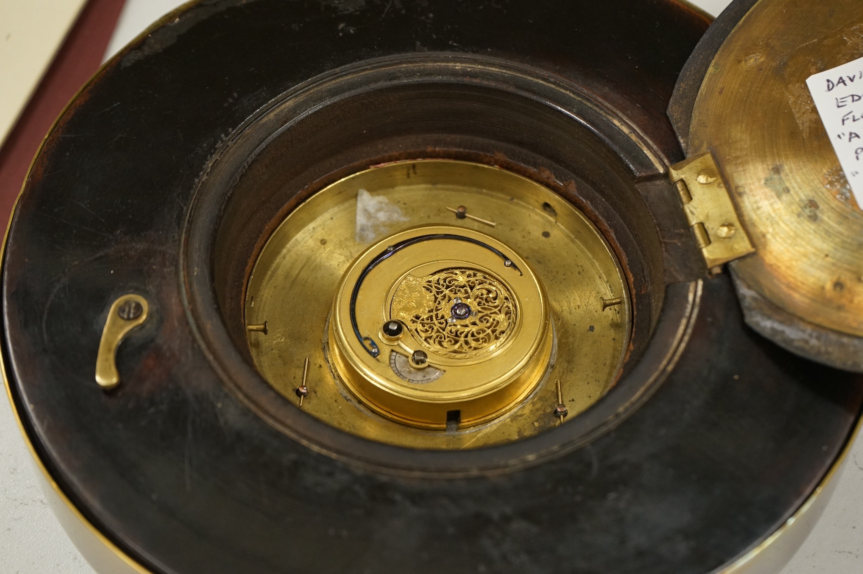 A George III brass-mounted mahogany sedan timepiece, signed David Whitelaw, Edinburgh and numbered 107, 17cm in diameter. Condition - good